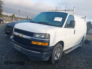 2018 Chevrolet Express Cargo Van with VIN 1GCWGAFG4J1904400, listed as a IAAI auction lot 41754700 with 119,196 mi miles. Bid and sale history available at carsss.com. Image 2.
