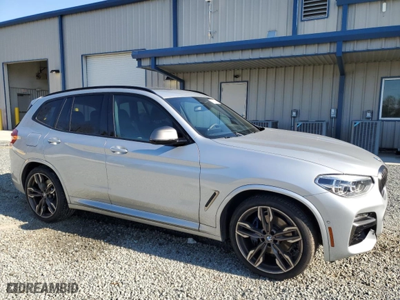 2021 BMW X3 M40i with VIN 5UXTY9C04M9E24998, listed as a Copart auction lot 87262434 with 50,722 mi miles and Salvage Title. Bid and sale history available at carsss.com. Image 4.