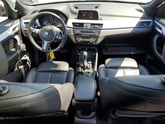 2018 BMW X1 xDrive28i z VIN WBXHT3C33J5L24441, wystawiony jako Copart lot #60468645 z przebiegiem 83 339 mil mil oraz Szkoda całkowita • Salvage title. Historia ofert i sprzedaży dostępna na DreamBid. Obrazek 8.