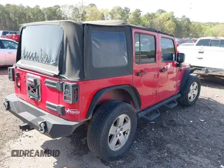 2007 Jeep Wrangler Unlimited X with VIN 1J4GB39197L150245, listed as a IAAI auction lot 41920390 with 239,532 mi miles and . Bid and sale history available at DreamBid. Image 4.