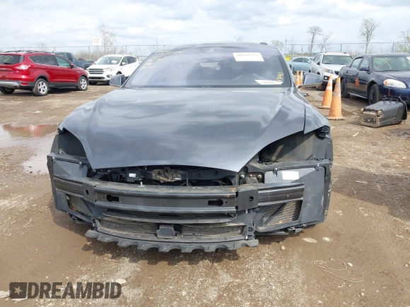 2015 Tesla Model S 85D with VIN 5YJSA1E21FF116775, listed as a IAAI auction lot 41876772 with 128,805 mi miles. Bid and sale history available at carsss.com. Image 6.