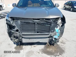 2020 Cadillac XT4 FWD Sport with VIN 1GYFZER4XLF032646, listed as a IAAI auction lot 42078928 with 11,987 mi miles and . Bid and sale history available at DreamBid. Image 6.