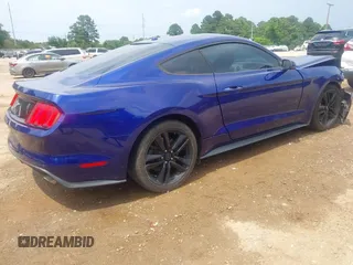 2015 Ford Mustang EcoBoost with VIN 1FA6P8TH5F5351686, listed as a IAAI auction lot 42290571 with 129,546 mi miles and . Bid and sale history available at DreamBid. Image 4.
