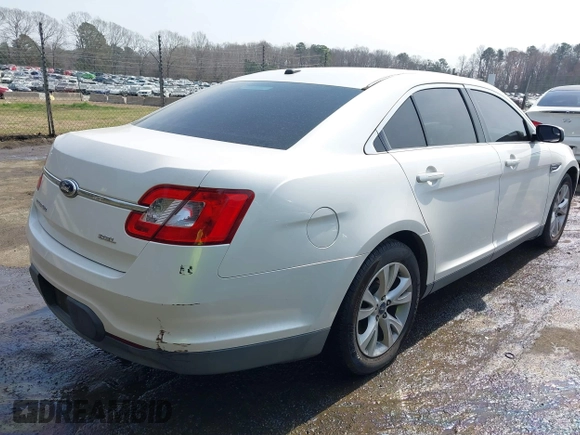 2012 Ford Taurus SEL with VIN 1FAHP2EW9CG121263, listed as a IAAI auction lot 41785838 with 185,433 mi miles and . Bid and sale history available at DreamBid. Image 4.
