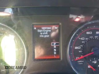 2014 Dodge Charger SXT with VIN 2C3CDXHG6EH166994, listed as a IAAI auction lot 41801739 with 163,314 mi miles. Bid and sale history available at carsss.com. Image 7.