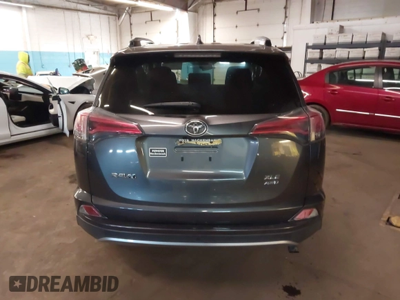 2018 Toyota RAV4 XLE with VIN JTMRFREV8JJ208377, listed as a IAAI auction lot 41629369 with 160,870 mi miles. Bid and sale history available at carsss.com. Image 16.