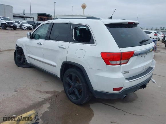 2013 Jeep Grand Cherokee Limited with VIN 1C4RJFBT3DC545662, listed as a IAAI auction lot 41576431 with 153,142 mi miles. Bid and sale history available at carsss.com. Image 3.