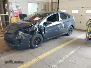 2015 Toyota Prius Four with VIN JTDKN3DU8F1983215, listed as a IAAI auction lot 41809447 with 135,899 mi miles. Bid and sale history available at carsss.com. Image 2.