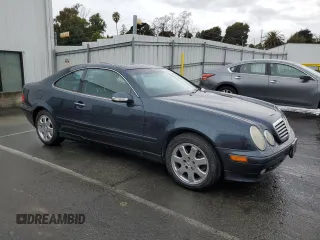 2000 Mercedes-Benz CLK 320/430 with VIN WDBLJ65GXYF158128, listed as a Copart auction lot 85065964 with 244,551 mi miles and Salvage Title. Bid and sale history available at DreamBid. Image 4.