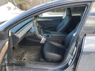 2023 Tesla Model 3 with VIN 5YJ3E1EA7PF496089, listed as a Copart auction lot 87101254 with 42,830 mi miles and Salvage Title. Bid and sale history available at DreamBid. Image 7.