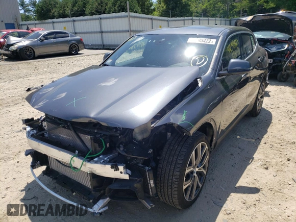 2021 BMW X2 xDrive28i with VIN WBXYJ1C02M5S79433, listed as a Copart auction lot 49393422 with 22,557 mi miles. Bid and sale history available at carsss.com. Image 2.