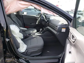 2021 Hyundai Ioniq SE with VIN KMHC65LD3MU249765, listed as a IAAI auction lot 41986977 with 63,363 mi miles and . Bid and sale history available at DreamBid. Image 5.