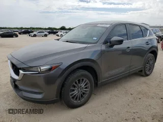2020 Mazda CX-5 Touring z VIN JM3KFACM7L0821913, wystawiony jako Copart lot #53661085 z przebiegiem 70 415 mil mil oraz Czysty tytuł • Clean title. Historia ofert i sprzedaży dostępna na DreamBid. Obrazek 1.