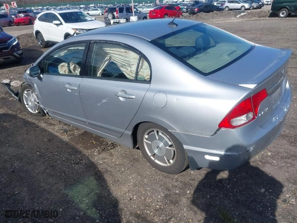 2009 Honda Civic Hybrid with VIN JHMFA36219S011249, listed as a IAAI auction lot 41605489 with 164,920 mi miles. Bid and sale history available at carsss.com. Image 3.