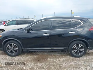 2018 Nissan Rogue SV with VIN JN8AT2MT8JW465012, listed as a IAAI auction lot 39376292 with 184,861 mi miles and . Bid and sale history available at DreamBid. Image 14.