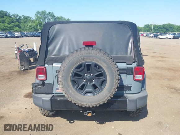 2015 Jeep Wrangler Freedom Edition with VIN 1C4AJWAG1FL714002, listed as a IAAI auction lot 42579024 with 98,732 mi miles and . Bid and sale history available at DreamBid. Image 16.