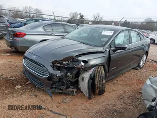 2015 Ford Fusion S Hybrid with VIN 3FA6P0UU7FR167229, listed as a IAAI auction lot 41684934 with 135,317 mi miles. Bid and sale history available at carsss.com. Image 6.