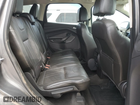 2013 Ford Escape Titanium z VIN 1FMCU9J90DUA72264, wystawiony jako Copart lot #49906445 z przebiegiem 126 527 mil mil oraz Szkoda całkowita • Salvage title. Historia ofert i sprzedaży dostępna na DreamBid. Obrazek 11.