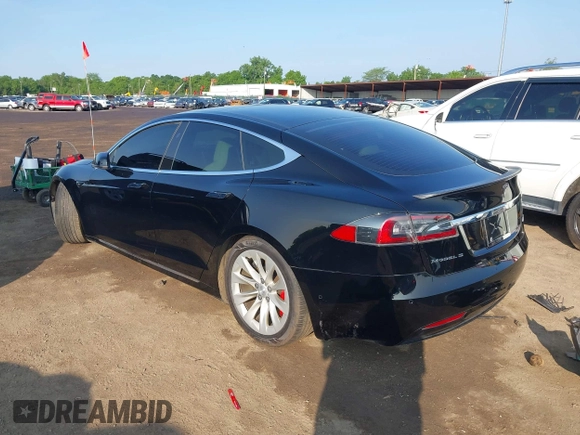 2018 Tesla Model S 75D with VIN 5YJSA1E45JF269282, listed as a IAAI auction lot 42404695 with 251,795 mi miles and . Bid and sale history available at DreamBid. Image 3.