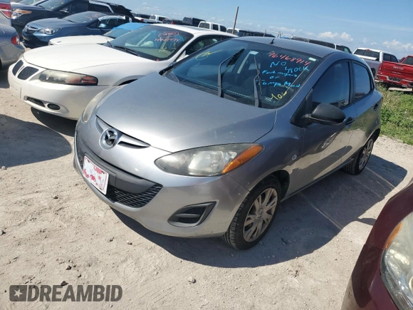 2014 Mazda 2 Sport with VIN JM1DE1KY6E0189739, listed as a Copart auction lot 76468914 with 107,164 mi miles and Salvage Title. Bid and sale history available at carsss.com. Image 1.