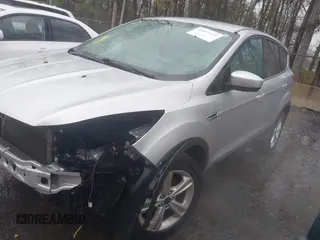 2013 Ford Escape SE with VIN 1FMCU0GX8DUD84074, listed as a IAAI auction lot 42003244 with 147,323 mi miles. Bid and sale history available at carsss.com. Image 17.