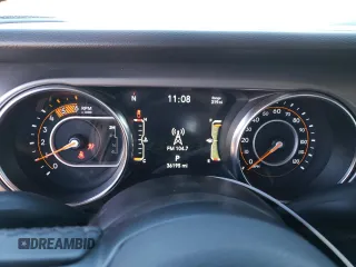 2022 Jeep Gladiator Willys with VIN 1C6JJTAM3NL132056, listed as a Copart auction lot 75723014 with 36,195 mi miles and Salvage title. Bid and sale history available at DreamBid. Image 9.
