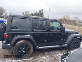 2023 Jeep Wrangler Sport S with VIN 1C4HJXDG8PW653828, listed as a IAAI auction lot 41239974 with 16,076 mi miles and . Bid and sale history available at DreamBid. Image 13.