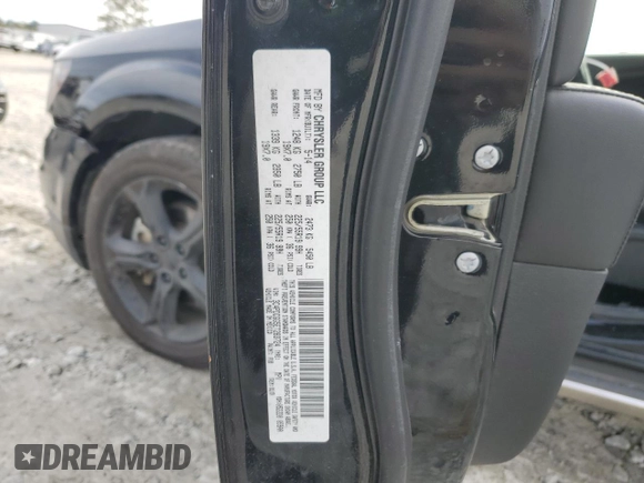 2014 Dodge Journey Crossroad with VIN 3C4PDCGG5ET283724, listed as a Copart auction lot 43251245 with 120,571 mi miles and Salvage title. Bid and sale history available at DreamBid. Image 13.