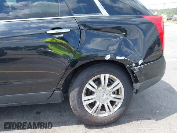 2014 Cadillac SRX with VIN 3GYFNAE30ES641616, listed as a IAAI auction lot 42000120 with 145,000 mi miles and . Bid and sale history available at DreamBid. Image 6.