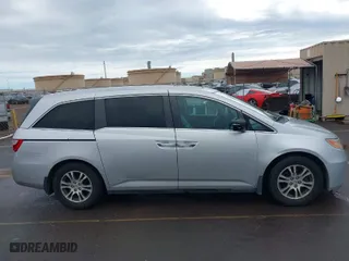 2012 Honda Odyssey EX-L with VIN 5FNRL5H68CB056567, listed as a IAAI auction lot 41014382 with 101,885 mi miles. Bid and sale history available at carsss.com. Image 13.