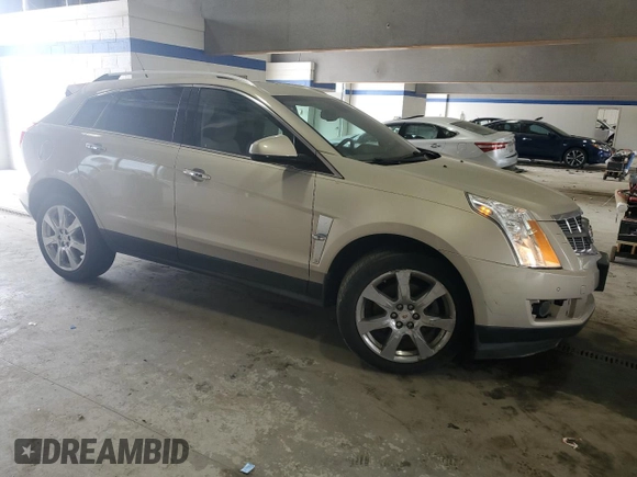 2012 Cadillac SRX Performance Collection with VIN 3GYFNBE31CS518975, listed as a Copart auction lot 51928865 with 152,449 mi miles and Clean Title. Bid and sale history available at carsss.com. Image 4.