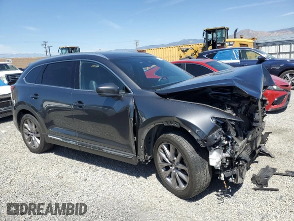 2021 Mazda CX-9 Carbon Edition with VIN JM3TCADYXM0519399, listed as a Copart auction lot 52714565 with 72,765 mi miles and Salvage title. Bid and sale history available at DreamBid. Image 4.