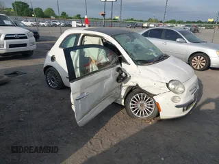 2012 FIAT 500 Lounge with VIN 3C3CFFCR2CT121388, listed as a IAAI auction lot 42013509 with 115,302 mi miles and . Bid and sale history available at DreamBid. Image 1.