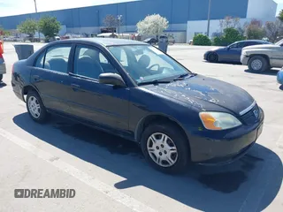 2001 Honda Civic DX with VIN 2HGES15241H573417, listed as a IAAI auction lot 41890215 with 335,619 mi miles. Bid and sale history available at carsss.com. Image 1.