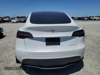 2024 Tesla Model Y Long Range with VIN 7SAYGDEE4RF054753, listed as a Copart auction lot 57989375 with 21,394 mi miles and Salvage title. Bid and sale history available at DreamBid. Image 6.