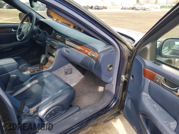 1999 Cadillac Seville Touring STS z VIN 1G6KY5493XU913994, wystawiony jako IAAI lot #41780695 z przebiegiem 60 375 mil mil oraz . Historia ofert i sprzedaży dostępna na DreamBid. Obrazek 5.