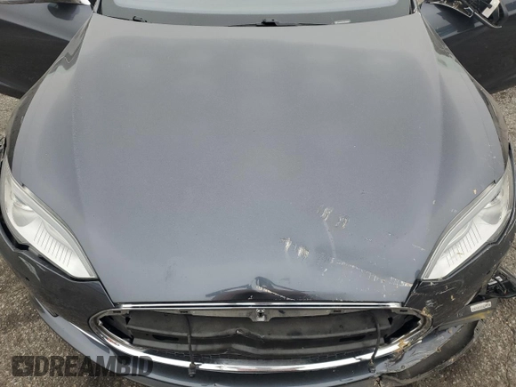 2014 Tesla Model S 60 with VIN 5YJSA1H10EFP60690, listed as a Copart auction lot 62515065 with 57,864 mi miles and Clean title. Bid and sale history available at DreamBid. Image 11.