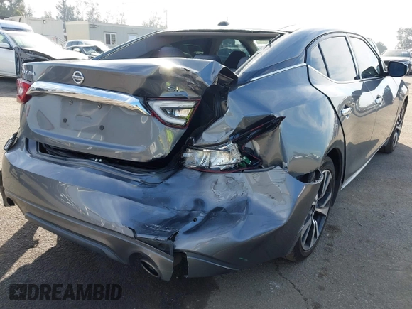 2017 Nissan Maxima SV with VIN 1N4AA6AP4HC404371, listed as a IAAI auction lot 41489579 with 117,677 mi miles. Bid and sale history available at carsss.com. Image 4.