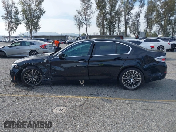 2018 BMW 5 Series 530i with VIN WBAJA5C56JG897692, listed as a IAAI auction lot 41813052 with 37,610 mi miles and . Bid and sale history available at DreamBid. Image 14.