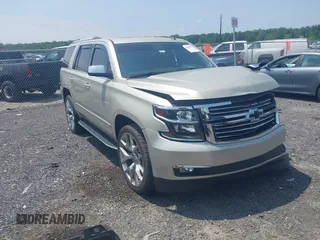 2015 Chevrolet Tahoe LTZ with VIN 1GNSKCKC5FR158079, listed as a IAAI auction lot 42446017 with 154,768 mi miles and . Bid and sale history available at DreamBid. Image 1.