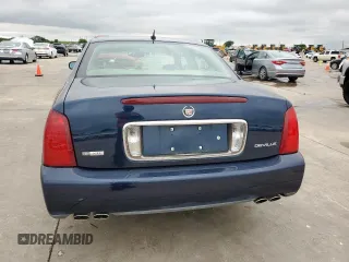 2005 Cadillac DeVille z VIN 1G6KD54Y75U129768, wystawiony jako Copart lot #55890325 z przebiegiem 97 463 mil mil oraz Czysty tytuł • Clean title. Historia ofert i sprzedaży dostępna na DreamBid. Obrazek 6.