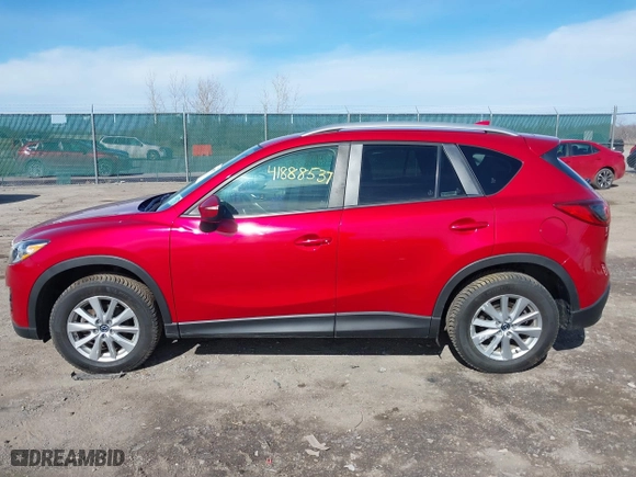 2016 Mazda CX-5 Touring with VIN JM3KE4CY5G0816285, listed as a IAAI auction lot 41888537 with 101,598 mi miles. Bid and sale history available at carsss.com. Image 14.