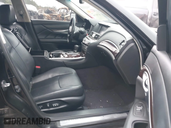2012 Infiniti M with VIN JN1BY1AP5CM333975, listed as a IAAI auction lot 41701701 with 130,828 mi miles and . Bid and sale history available at DreamBid. Image 5.