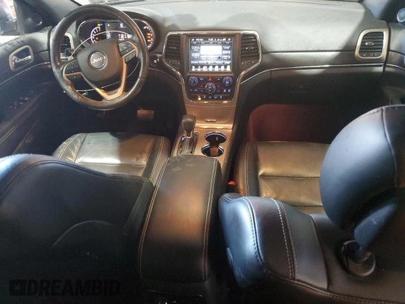2017 Jeep Grand Cherokee Limited 75th Anniversary with VIN 1C4RJFBG3HC843573, listed as a Copart auction lot 86704244 with 70,659 mi miles and Salvage title. Bid and sale history available at DreamBid. Image 8.