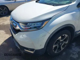 2019 Honda CR-V Touring с VIN JHLRW2H98KX003911, выставлен на аукционе IAAI как лот 42306400 с пробегом 105 780 миль миль и . История ставок и продаж доступна на DreamBid. Изображение 17.