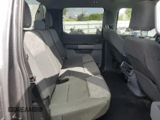 2023 Ford F-150 Lightning Pro with VIN 1FT6W1EV0PWG34788, listed as a Copart auction lot 54454805 with 11,432 mi miles and Salvage title. Bid and sale history available at DreamBid. Image 10.