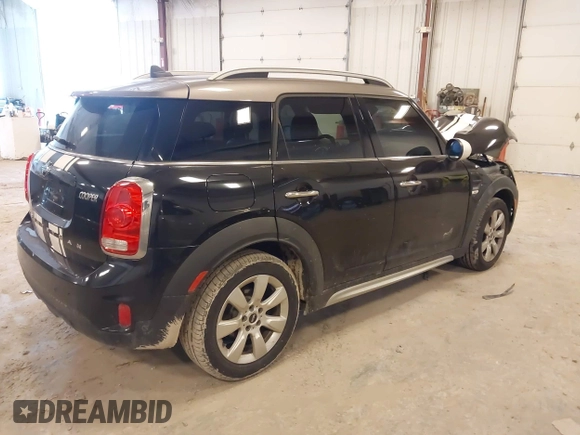 2019 MINI Countryman Cooper with VIN WMZYV5C53K3E05041, listed as a IAAI auction lot 41684566 with 65,237 mi miles. Bid and sale history available at carsss.com. Image 4.