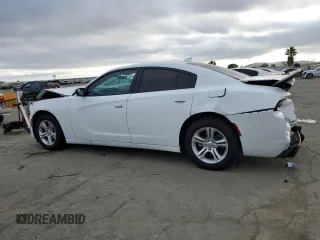2023 Dodge Charger SXT with VIN 2C3CDXBG5PH703978, listed as a Copart auction lot 50657745 with 7,198 mi miles and Salvage Title. Bid and sale history available at carsss.com. Image 2.