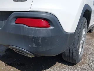 2015 Jeep Cherokee Latitude with VIN 1C4PJLCS3FW670254, listed as a IAAI auction lot 42060659 with 164,291 mi miles. Bid and sale history available at carsss.com. Image 21.