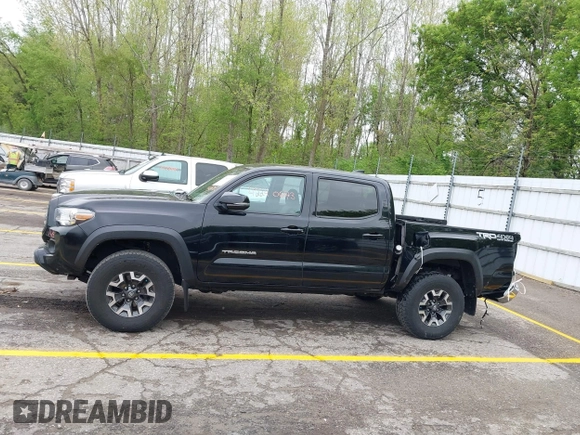 2021 Toyota Tacoma SR with VIN 3TMCZ5AN0MM417261, listed as a IAAI auction lot 42240693 with 38,625 mi miles and . Bid and sale history available at DreamBid. Image 15.